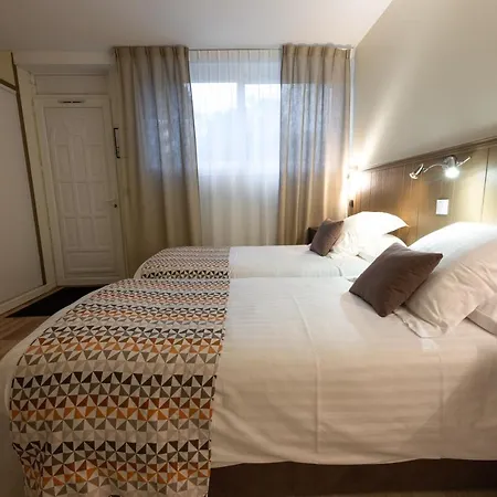 فندق Logis Reve De Sable 3*